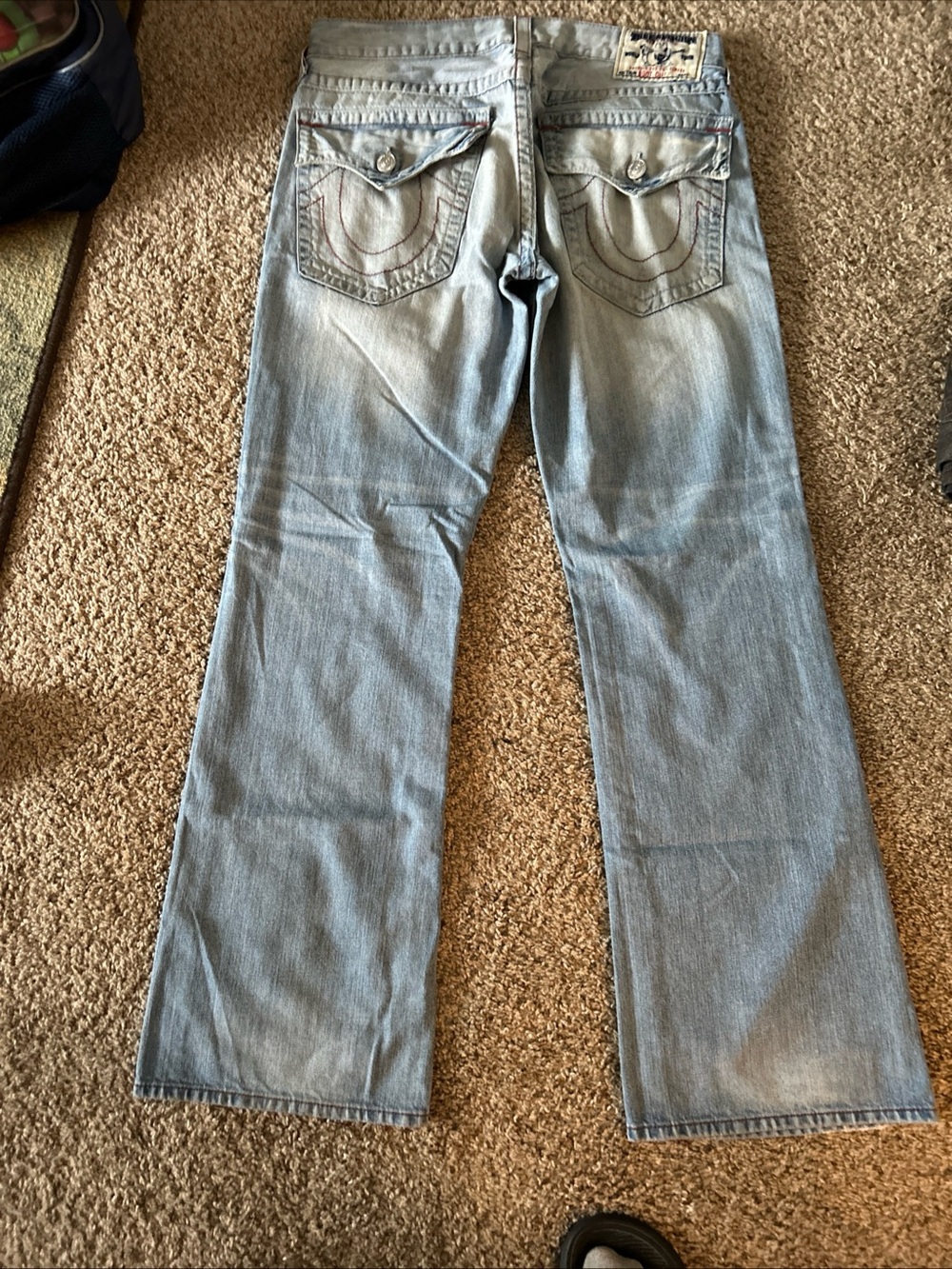 True Religion Light Wash Flared Jeans with Back Pocket Detail